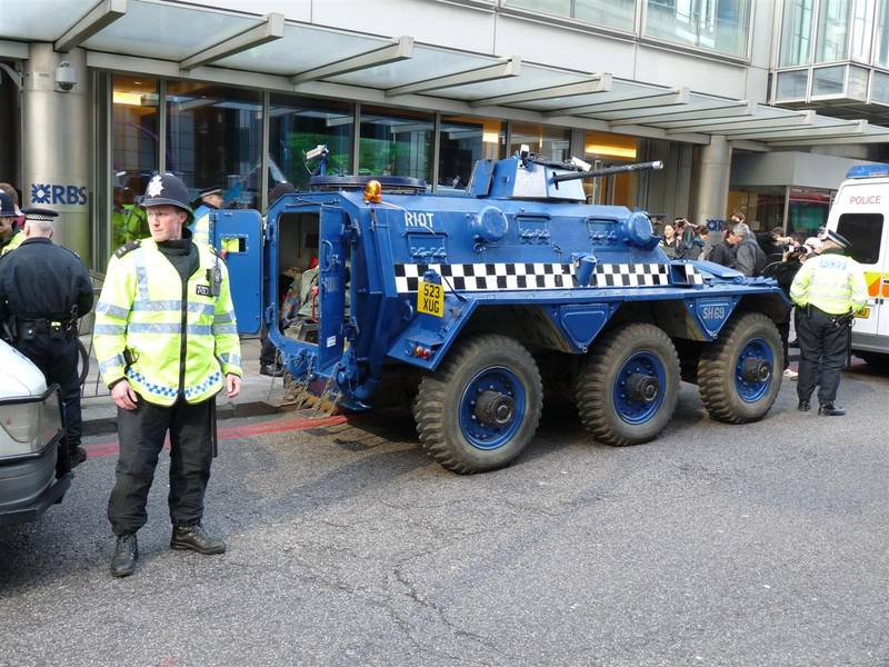 Illustration for article titled Vigilante Hippie Six-Wheeled Riot Tank Tries To Battle G20 Summit Protesters